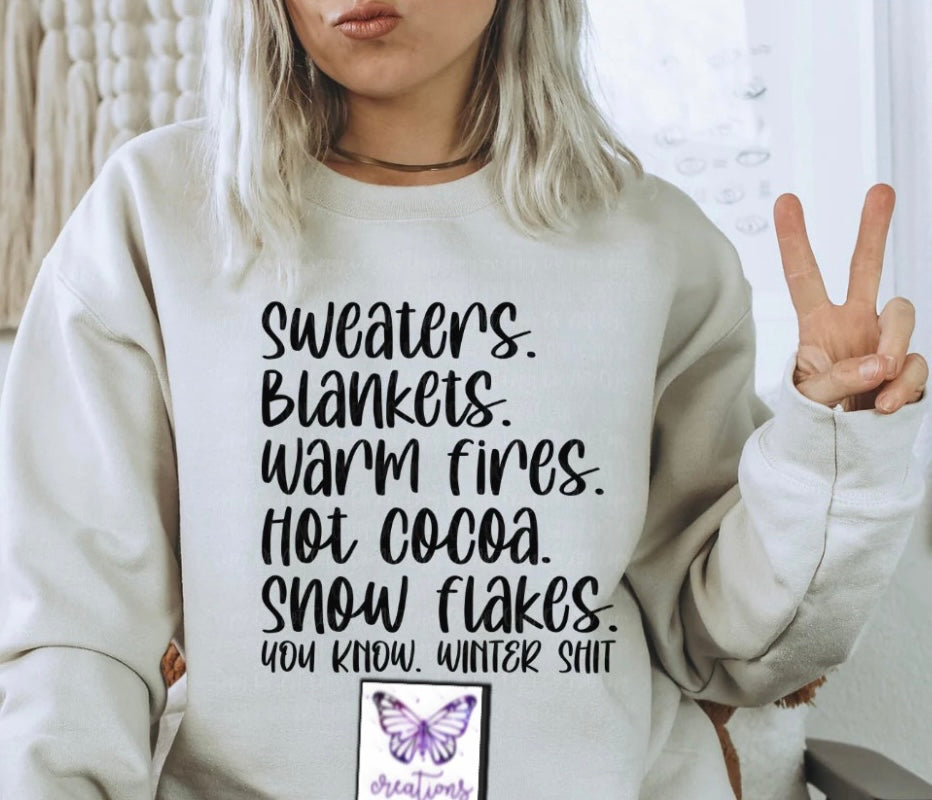 Sweaters. Blankets. Warm fires. Hot cocoa. Snowflakes. You know winter shit